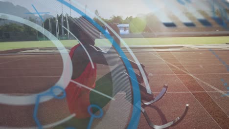 animation of digital data processing over disabled male athlete with running blades on running track