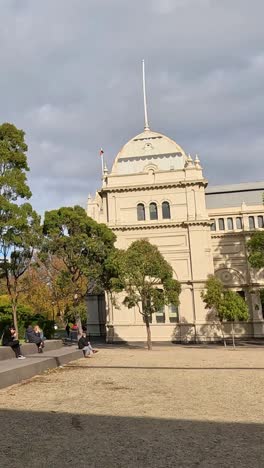 people walking near melbourne\'s exhibition building