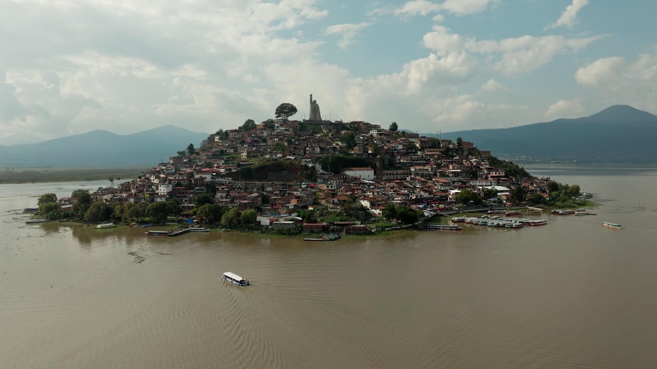 DOLLY IN DRONE SHOT OF JANITZIO ISLAND AT PATZCUARO LAKE