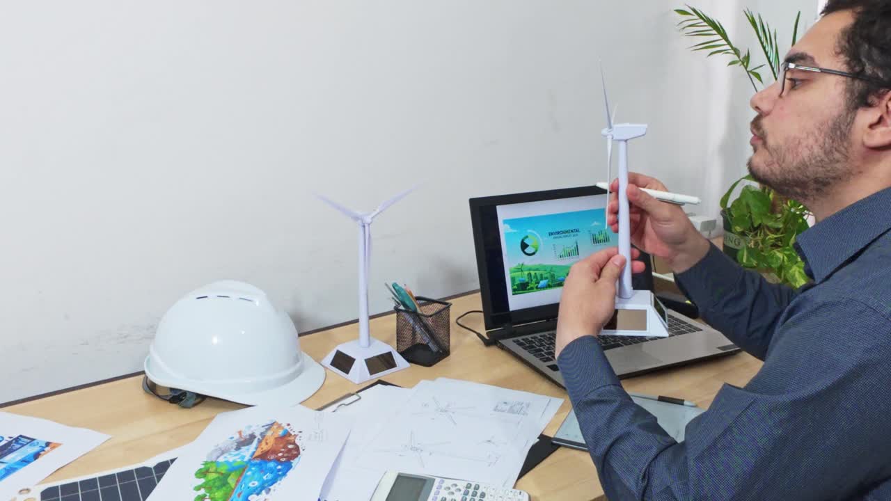 Engineer Performing a Final Inspection of a Wind Turbine Prototype