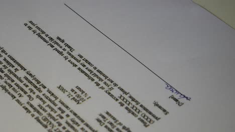 Business-woman-signing-business-contract-agreement,-close-up-of-female-hand-with-pen-writing-signature