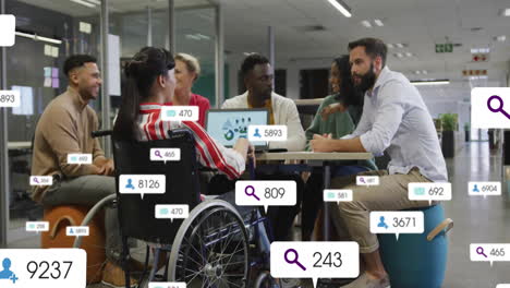 animation of media icons over diverse and disabled business people discussing work