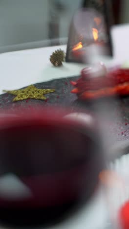 a woman lights a candle for a romantic sit, close up shot, insert shot