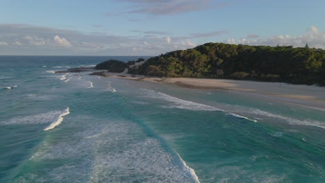 Turquoise-Blue-Waves-In-Coral-Sea-Washing-Up-On-Sandy-Beach-In-Summer---Secluded-Beach-In-Point-Lookout,-North-Stradbroke,-QLD,-Australia