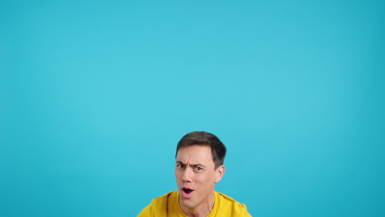 Man looking up with various facial expressions