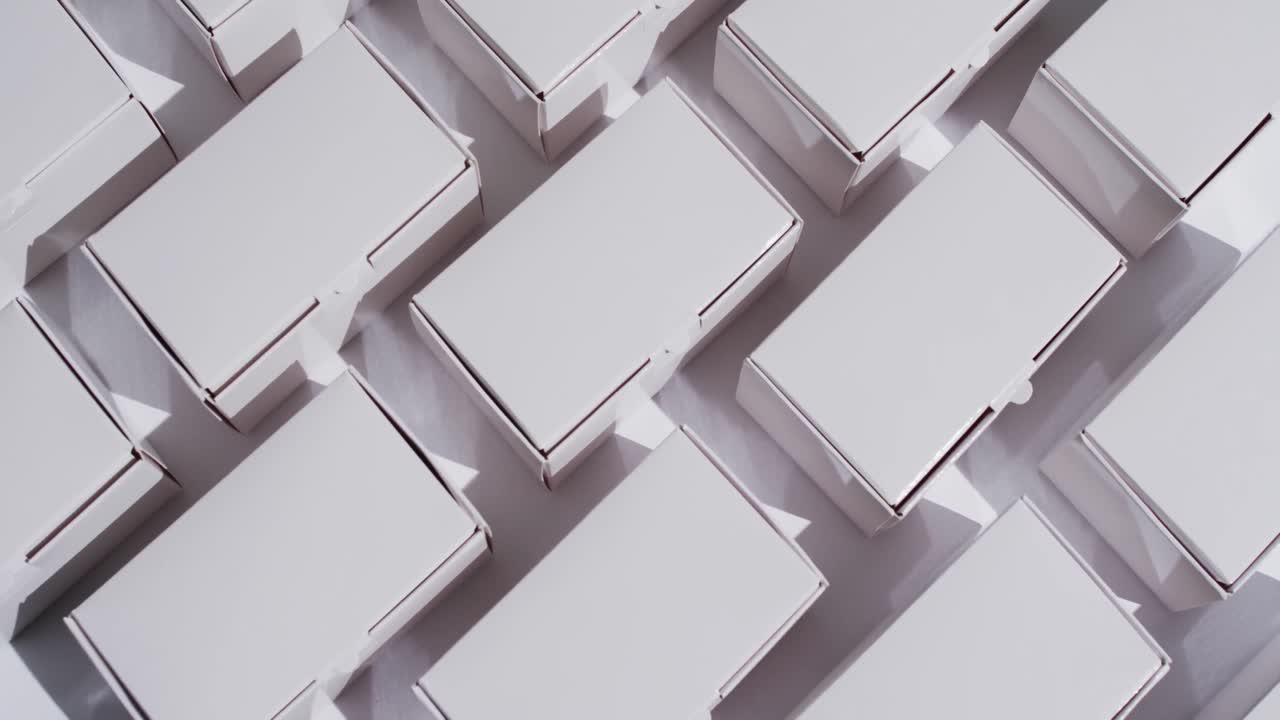 Video of cardboard boxes with copy space over white background