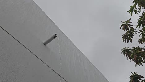 Roof-gutters-overflowing-during-a-heavy-rainstorm