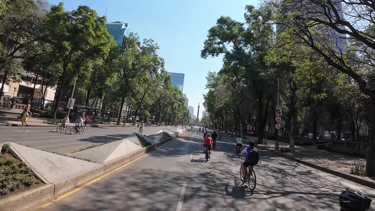 Shot of diverse people doing exercise at reforma avenue in mexico city