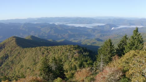 aerial drone footage of the smokey blue ridge mountain ranges of appalachia in north carolina usa