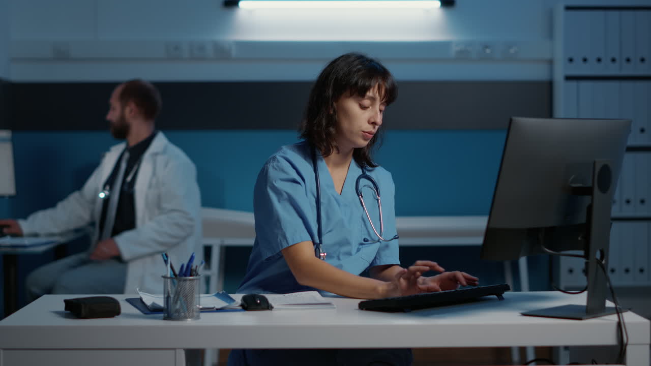 Medical Professional Working at Desk