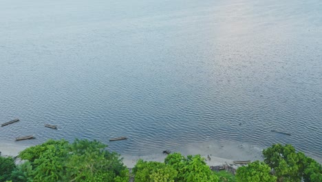 village in tropical forest near the sea