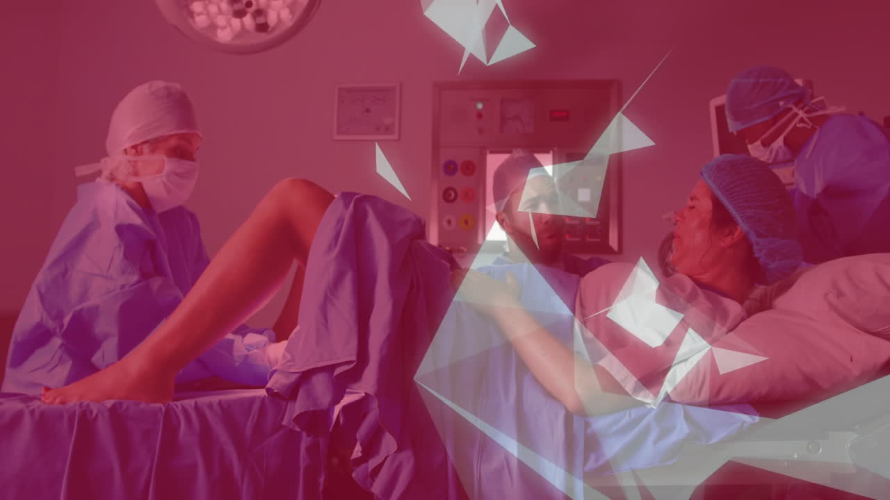 medical team supporting laboring woman in delivery room, with animated vital-signs graph overlay