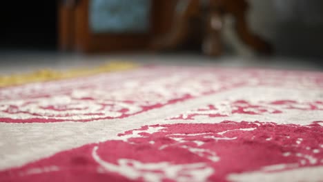 close-up of a patterned red carpet