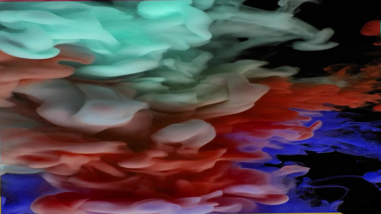 Abstract Nuvole di inchiostro colorate che girano nell'acqua