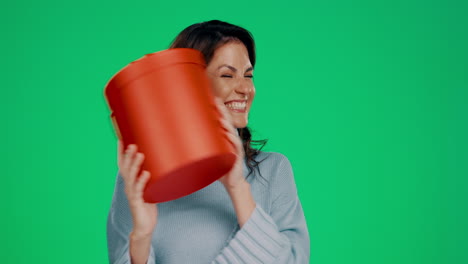 woman shake gift, box and studio package