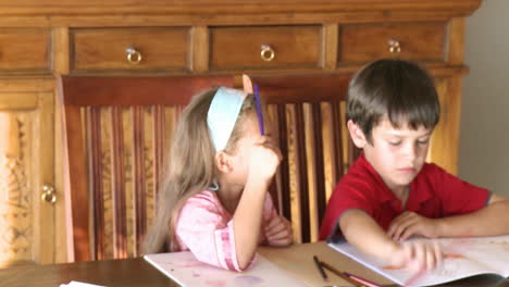 two children painting together