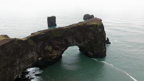 dyrholaey peninsula arch in vik, iceland