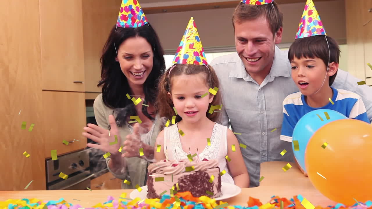 animación de confeti cayendo sobre una familia feliz en una fiesta de cumpleaños