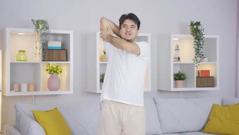 man doing arm exercise. wellness at home, fitness.