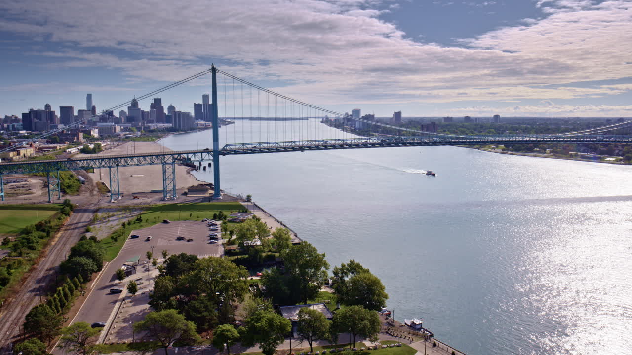 Stunning cinematic drone orbit of the bridge uniting the United States and Canada