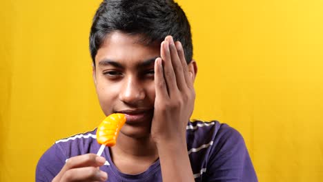 Teenage-boy-with-sensitive-teeth-,