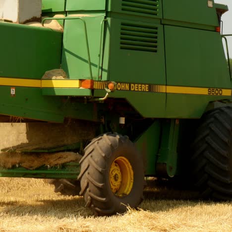 modern combine harvesting grain in the field