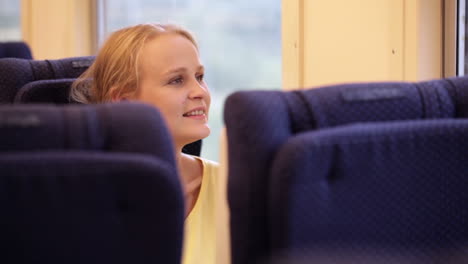 smiling woman in the train