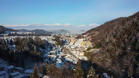 snowy valley town in yamanouchi, nagano japan