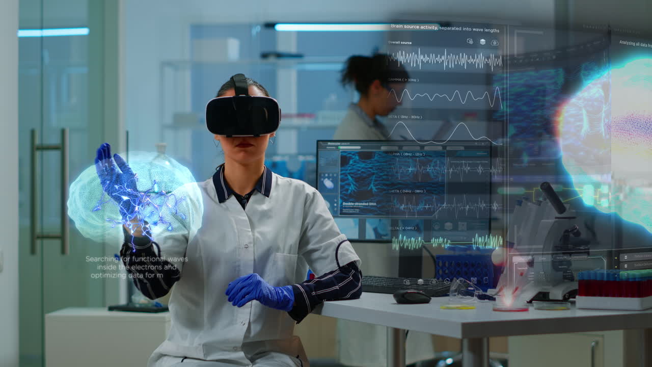 Scientist in lab wearing vr goggles working on augmented reality ...