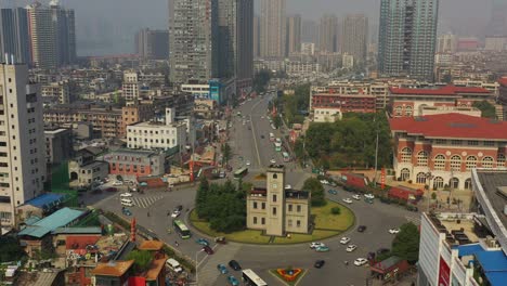 sunny day flight over changsha city center traffic street circle aerial panorama 4k china