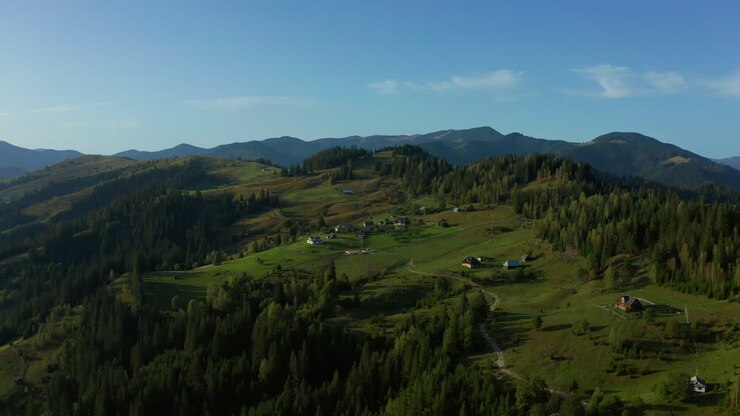 Mountain rural land against blue cloudless sky