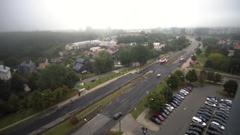 establishing shot of a city covered in fog