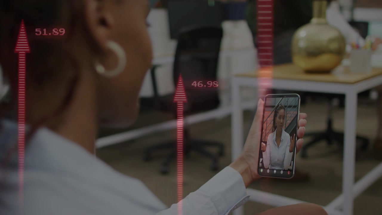 woman holding smartphone conducting remote business call in office, displaying animated interface