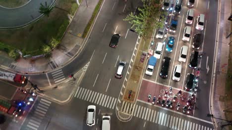 night aerial view of city streets and traffic