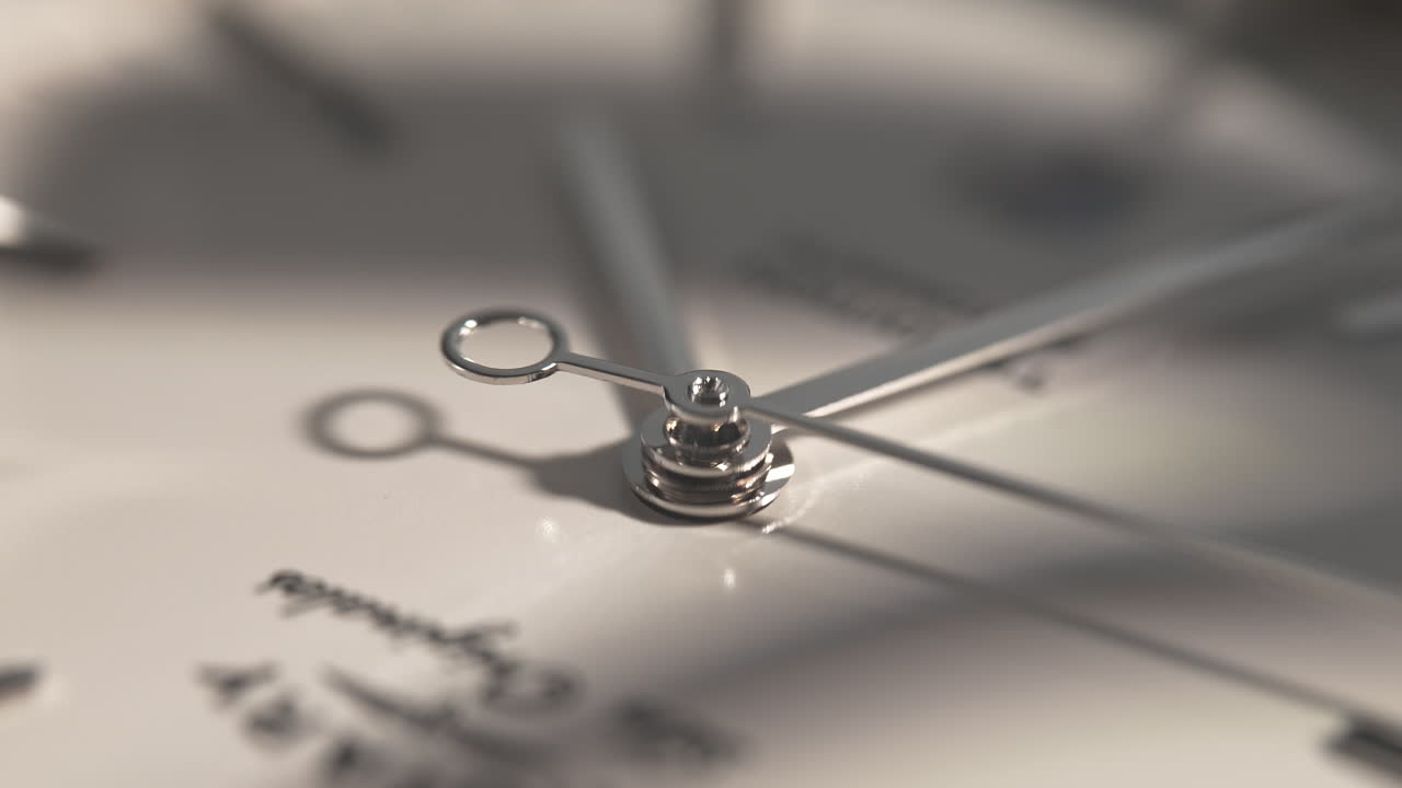 Analog Wristwatch With An Elegant White Dial And Metallic Elements In Macro and Slow Motion