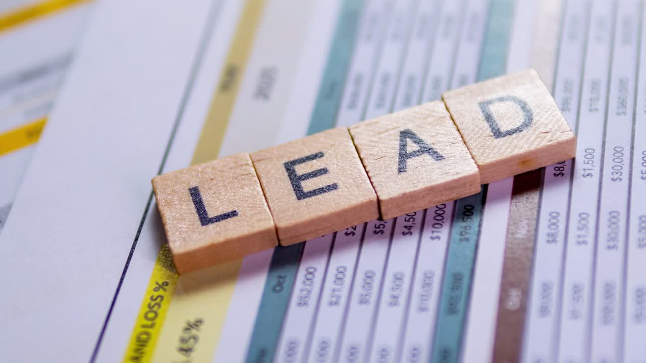 Explore how effective LEAD metrics can drive business success in a focused office setting.