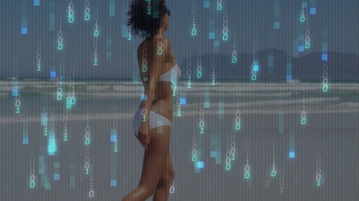 Woman walking sunny beach initiating technology rain while holding small bottle scanning horizon
