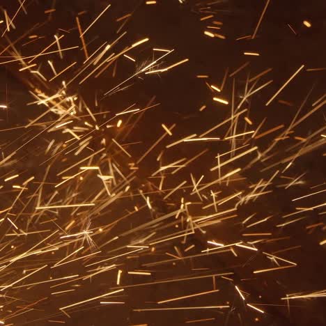 cutting steel with angle grinder in workshop