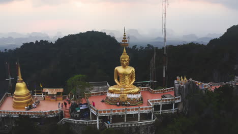 Golden-meditating-Buddha-statue-in-Tiger-cave-temple-in-Thailand