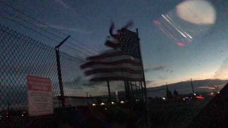 american flag blowing in breeze