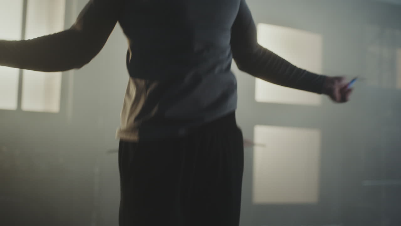 People Jumping Rope in Gym