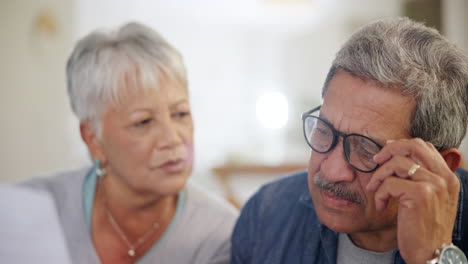 Old-people,-reading-document-for-bills