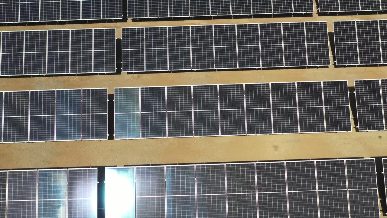 drone camera flight over the solar penal sun glare fell in the solar penal.4k video