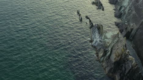 aerial soars over jagged stones at dunmore head