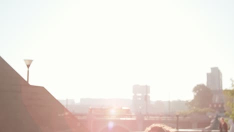 fitness girl running in the city and checking her smartwatch