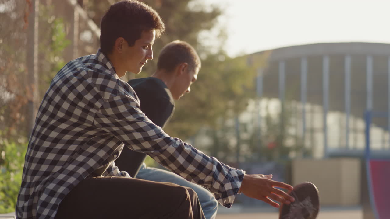 Slowmo of Teenagers in Skatepark