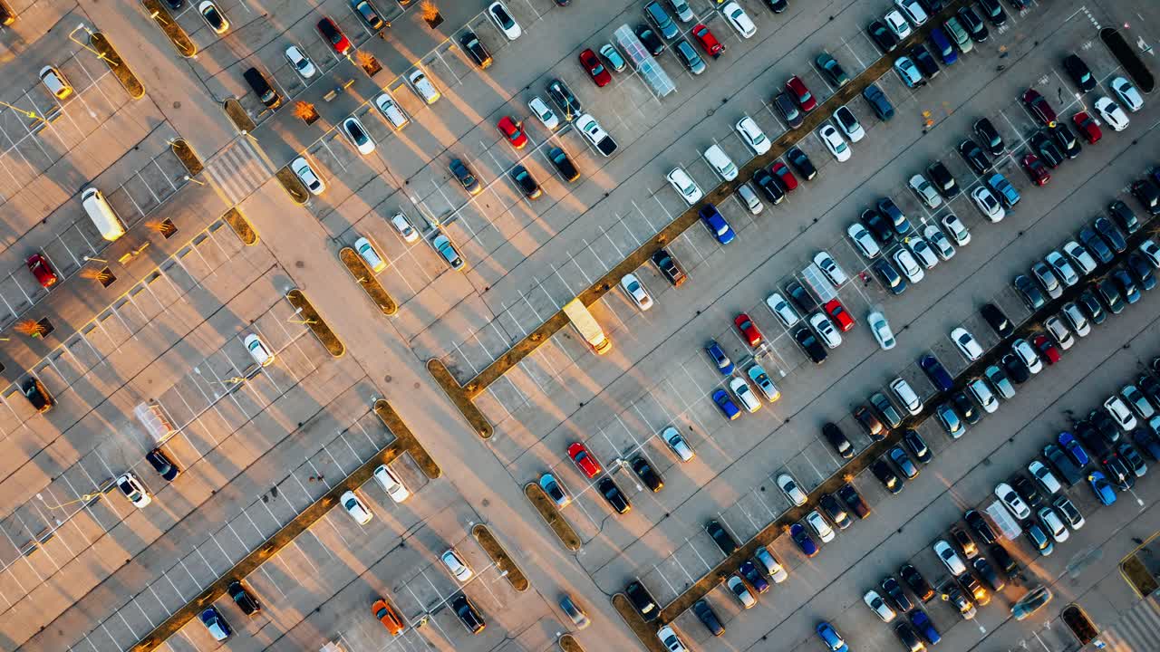 Sunset timelapse showing Riga parking lot from above with shadows shifting fast