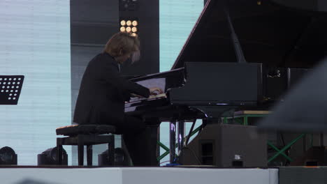 pianist performing on stage