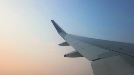 flight going in clouds closeup view in india