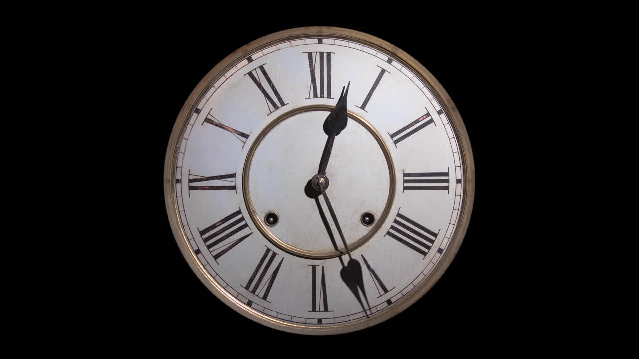 TIMELAPSE, CUT OUT ON BLACK, an antique clock with roman numerals